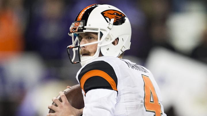 Nov 22, 2014; Seattle, WA, USA; Oregon State Beavers quarterback Sean Mannion (4) looks to pass the ball against the Washington Huskies during the second half at Husky Stadium. Washington defeated Oregon State 37-13. Mandatory Credit: Steven Bisig-Imagn Images Nov 22, 2014; Seattle, WA, USA; Oregon State Beavers quarterback Sean Mannion (4) looks to pass the ball against the Washington Huskies during the second half at Husky Stadium. Washington defeated Oregon State 37-13. Mandatory Credit: Steven Bisig-Imagn Images
