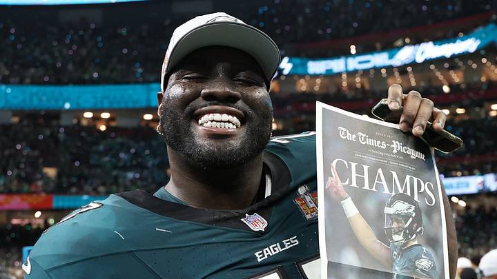 Feb 9, 2025; New Orleans, LA, USA; Philadelphia Eagles offensive tackle Mekhi Becton (77) celebrates on the field after Super Bowl LIX against the Kansas City Chiefs at Caesars Superdome. Mandatory Credit: Geoff Burke-Imagn Images