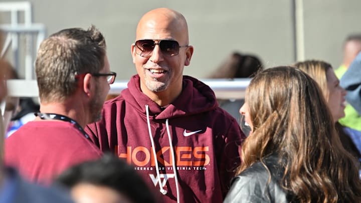 Nov 22, 2025; Blacksburg, Virginia, USA; Incoming head coach James Franklin speaks to fans on the sideline before the game at Lane Stadium. Mandatory Credit: Brian Bishop-Imagn Images