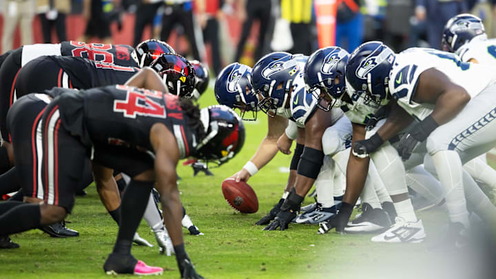 Dec 8, 2024; Glendale, Arizona, USA; General view down the line of scrimmage as the Seattle Seahawks prepare to snap the ball against the Arizona Cardinals at State Farm Stadium.