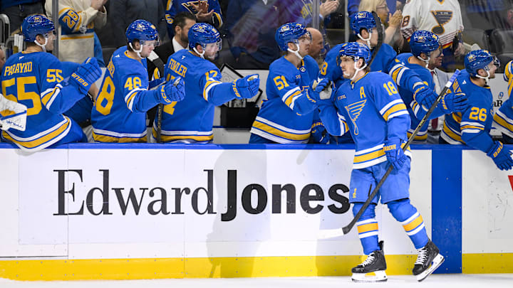 Nov 14, 2025; St. Louis, Missouri, USA; St. Louis Blues center Robert Thomas (18) is congratulated by teammates after scoring against the Philadelphia Flyers during the third period at Enterprise Center. Mandatory Credit: Jeff Curry-Imagn Images Nov 14, 2025; St. Louis, Missouri, USA; St. Louis Blues center Robert Thomas (18) is congratulated by teammates after scoring against the Philadelphia Flyers during the third period at Enterprise Center. Mandatory Credit: Jeff Curry-Imagn Images