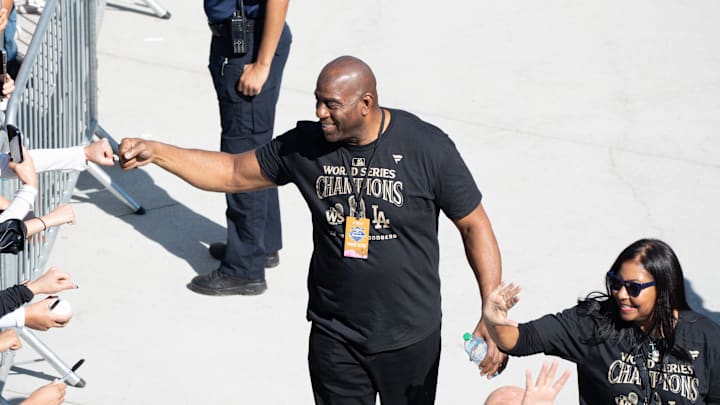Los Angeles Dodgers minority owner and former Los Angeles Laker Magic Johnson arrives at Dodger Stadium for the team’s World Series Championship celebration on Nov. 1, 2024. Los Angeles Dodgers minority owner and former Los Angeles Laker Magic Johnson arrives at Dodger Stadium for the team’s World Series Championship celebration on Nov. 1, 2024.