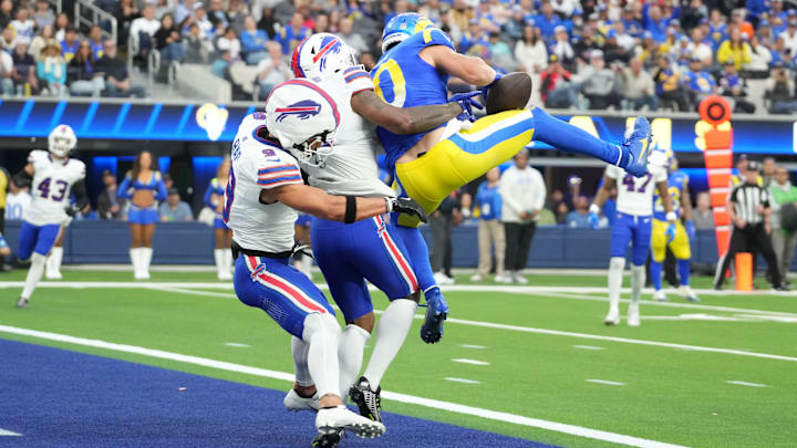 Dec 8, 2024; Inglewood, California, USA; Los Angeles Rams wide receiver Cooper Kupp (10) catches a 17-yard touchdown pass against Buffalo Bills safety Taylor Rapp (9) and cornerback Rasul Douglas (31) in the third quarter at SoFi Stadium