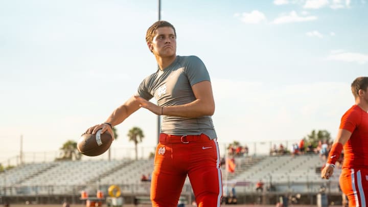 2026 quarterback Cole Leinart warming up before a game in 2023.