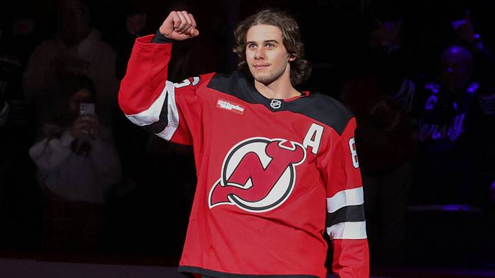 New Jersey Devils center Jack Hughes (86) is honored for Team USA’s gold-medal-winning performance at the 2026 Winter Olympics: Ed Mulholland-Imagn Images