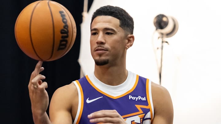Phoenix Suns guard Devin Booker (1) poses for portrait during Media Day at PHX Arena.