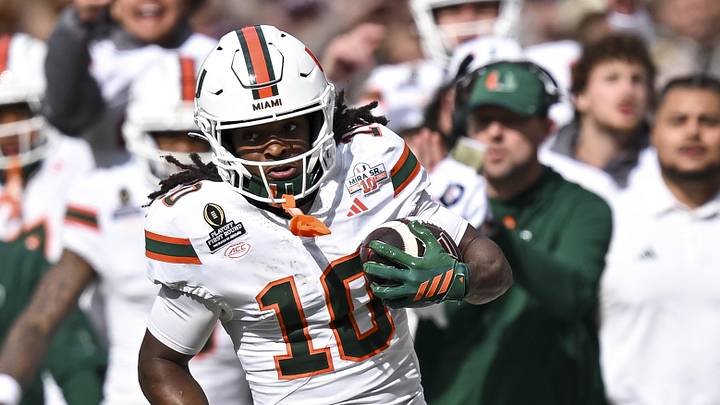 Dec 20, 2025; College Station, TX, USA; Miami Hurricanes wide receiver Malachi Toney (10) runs the ball during the first half against the Texas A&M Aggies at Kyle Field. Mandatory Credit: Maria Lysaker-Imagn Images