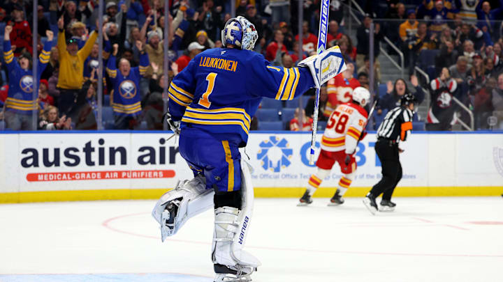 Nov 9, 2024; Buffalo, New York, USA;  Buffalo Sabres goaltender Ukko-Pekka Luukkonen (1) reacts after winning the game in a shootout against the Calgary Flames at KeyBank Center. Mandatory Credit: Timothy T. Ludwig-Imagn Images