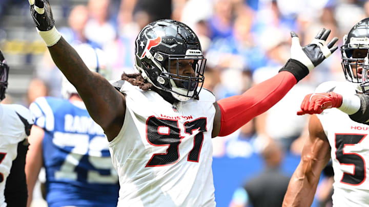 Sep 8, 2024; Indianapolis, Indiana, USA; Houston Texans defensive end Mario Edwards Jr. (97) celebrates a sack during the second quarter against the Indianapolis Colts at Lucas Oil Stadium. Mandatory Credit: Marc Lebryk-Imagn Images