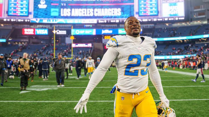 Dec 28, 2024; Foxborough, Massachusetts, USA; Los Angeles Chargers safety Tony Jefferson (23) celebrates after defeating the New England Patriots at Gillette Stadium. Mandatory Credit: David Butler II-Imagn Images