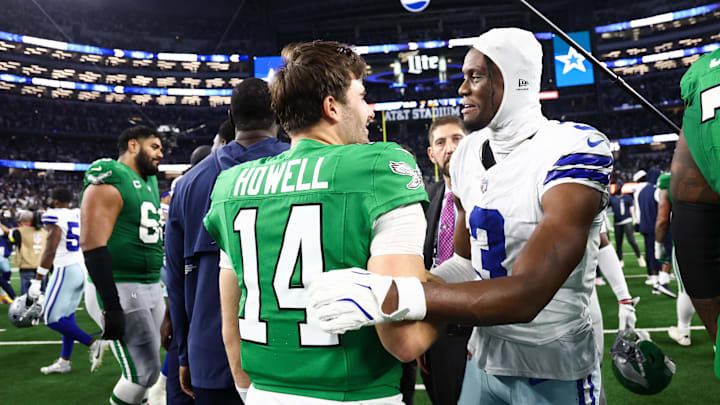 Nov 23, 2025; Arlington, Texas, USA; Dallas Cowboys wide receiver George Pickens (3) shakes hands with Philadelphia Eagles quarterback Sam Howell (14) after the game at AT&T Stadium. Mandatory Credit: Kevin Jairaj-Imagn Images