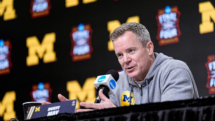 Michigan head coach Dusty May speaks at a press conference ahead of practice at Lucas Oil Stadium in Indianapolis for practice on Friday, April 3, 2026.