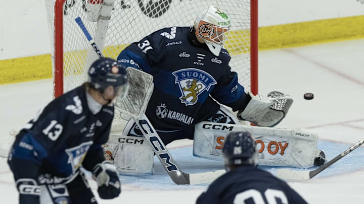 Aug 3, 2024; Plymouth, MI, USA; Finland's goaltender Kim Saarinen (31) makes a leg pad save against Sweden during the second period of the 2024 World Junior Summer Showcase at USA Hockey Arena. Mandatory Credit: David Reginek-Imagn Images