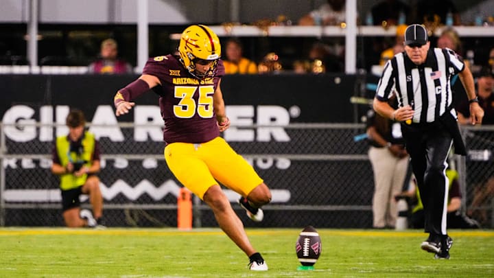 Aug 30, 2025; Tempe, Arizona, USA;  Arizona State Sun Devils place kicker Jesus Gomez (35) kicks off after the first touchdown during the first quarter between Arizona State Sun Devils and Northern Arizona Lumberjacks at Mountain America Stadium. Mandatory Credit: Arianna Grainey-Imagn Images