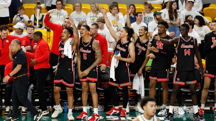 Jan 10, 2026; Waco, Texas, USA; The Houston Cougars bench celebrates after a play against the Baylor Bears during the second half at Paul and Alejandra Foster Pavilion. Jan 10, 2026; Waco, Texas, USA; The Houston Cougars bench celebrates after a play against the Baylor Bears during the second half at Paul and Alejandra Foster Pavilion.