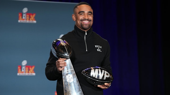 Philadelphia Eagles quarterback Jalen Hurts (1) poses with the Vince Lombardi trophy at the Super Bowl LIX Winning Head Coach and Most Valuable Player press conference at the Ernest N. Morial Convention Center. Philadelphia Eagles quarterback Jalen Hurts (1) poses with the Vince Lombardi trophy at the Super Bowl LIX Winning Head Coach and Most Valuable Player press conference at the Ernest N. Morial Convention Center.
