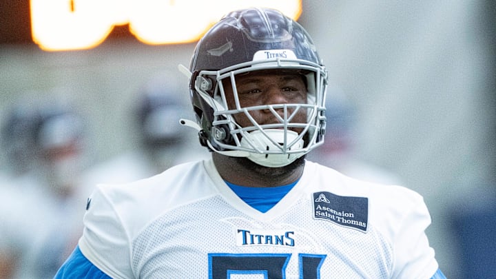 Defensive lineman Keondre Coburn (91) runs through drills during the Tennessee Titans mandatory mini-camp at Ascension Saint Thomas Sports Park in Nashville, Tenn., Tuesday, June 4, 2024. Defensive lineman Keondre Coburn (91) runs through drills during the Tennessee Titans mandatory mini-camp at Ascension Saint Thomas Sports Park in Nashville, Tenn., Tuesday, June 4, 2024.