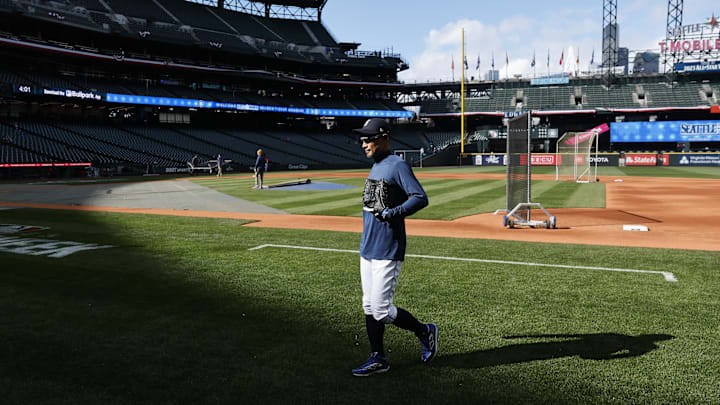Seattle Mariners former outfielder Ichiro Suzuki walks to the dugout following batting practice against the Cleveland Guardians at T-Mobile Park on April 1.