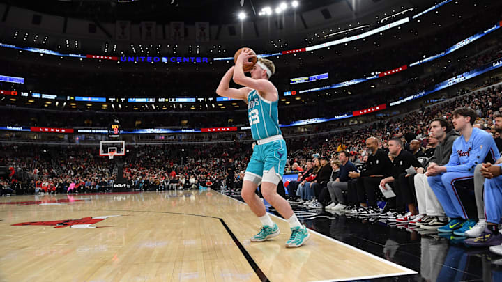 Jan 3, 2026; Chicago, Illinois, USA; Charlotte Hornets guard Liam McNeeley (33) goes up for a shot against the Chicago Bulls during the first half at United Center. Jan 3, 2026; Chicago, Illinois, USA; Charlotte Hornets guard Liam McNeeley (33) goes up for a shot against the Chicago Bulls during the first half at United Center.