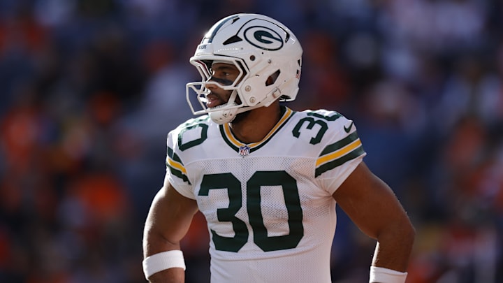 Dec 14, 2025; Denver, Colorado, USA; Green Bay Packers running back Chris Brooks (30) warms up before a game against the Denver Broncos at Empower Field at Mile High. Mandatory Credit: Isaiah J. Downing-Imagn Images