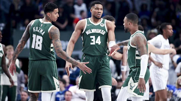 Mar 1, 2025; Dallas, Texas, USA: Milwaukee Bucks forward Giannis Antetokounmpo (34) celebrates with Milwaukee Bucks guard Damian Lillard (0) and Milwaukee Bucks forward Kyle Kuzma (18) against the Dallas Mavericks during the first half at American Airlines Center. Mandatory Credit: Kevin Jairaj-Imagn Images Mar 1, 2025; Dallas, Texas, USA: Milwaukee Bucks forward Giannis Antetokounmpo (34) celebrates with Milwaukee Bucks guard Damian Lillard (0) and Milwaukee Bucks forward Kyle Kuzma (18) against the Dallas Mavericks during the first half at American Airlines Center. Mandatory Credit: Kevin Jairaj-Imagn Images