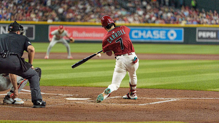 Sep 21, 2025; Phoenix, Arizona, USA; Arizona Diamondbacks outfielder Corbin Carroll (7) hits a home run in the second inning against the Philadelphia Phillies at Chase Field. Mandatory Credit: Allan Henry-Imagn Images Sep 21, 2025; Phoenix, Arizona, USA; Arizona Diamondbacks outfielder Corbin Carroll (7) hits a home run in the second inning against the Philadelphia Phillies at Chase Field. Mandatory Credit: Allan Henry-Imagn Images