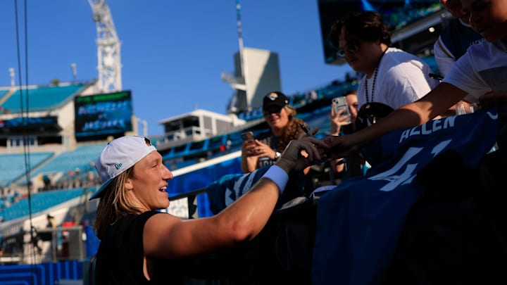 Jacksonville Jaguars quarterback Trevor Lawrence (16) signs autographs before a preseason NFL football game Saturday, Aug. 17, 2024 at EverBank Stadium in Jacksonville, Fla. [Corey Perrine/Florida Times-Union]