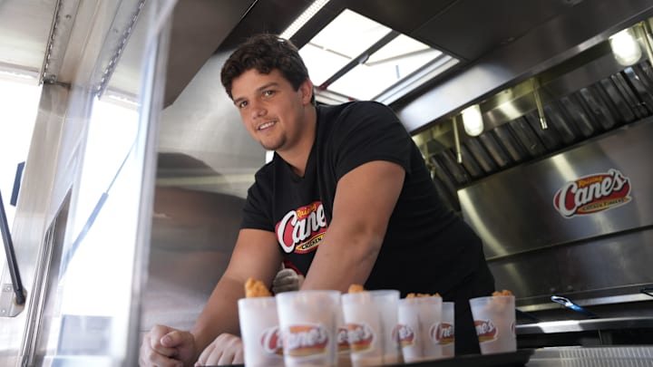 Will Campbell serving Raising Cane's ahead of the 2025 NFL Draft in Green Bay, WI. Will Campbell serving Raising Cane's ahead of the 2025 NFL Draft in Green Bay, WI.