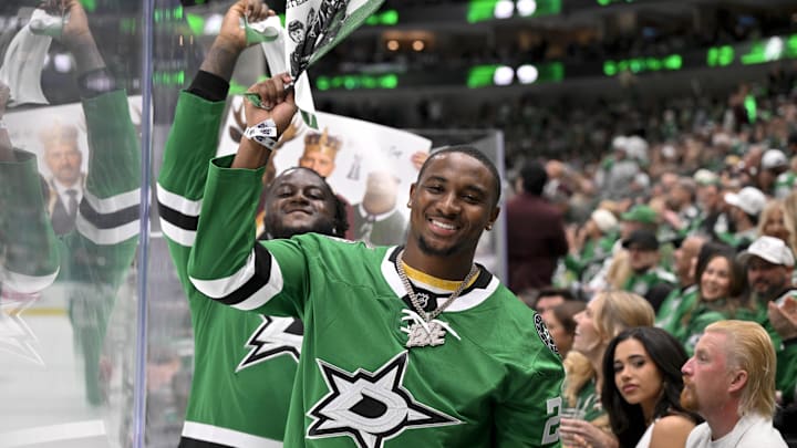 Dallas Cowboys rookie Donovan Ezeiruaku poses for a photo during a game between the Dallas Stars and the Edmonton Oilers.