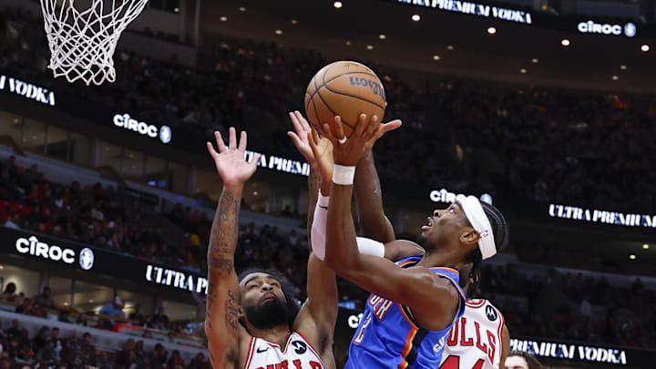 Oct 26, 2024; Chicago, Illinois, USA; Oklahoma City Thunder guard Shai Gilgeous-Alexander (2) goes to the basket against the Chicago Bulls during the second half at United Center. Mandatory Credit: Kamil Krzaczynski-Imagn Images