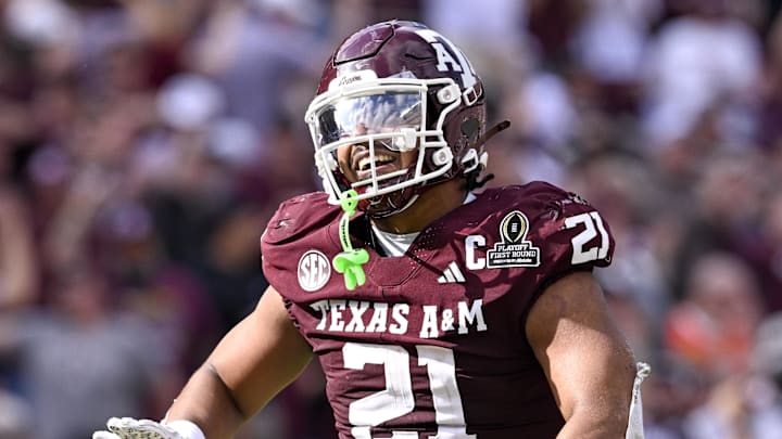 Dec 20, 2025; College Station, TX, USA; Texas A&M Aggies linebacker Taurean York (21) celebrates during the game between the Aggies and the Hurricanes at Kyle Field. Mandatory Credit: Jerome Miron-Imagn Images Dec 20, 2025; College Station, TX, USA; Texas A&M Aggies linebacker Taurean York (21) celebrates during the game between the Aggies and the Hurricanes at Kyle Field. Mandatory Credit: Jerome Miron-Imagn Images