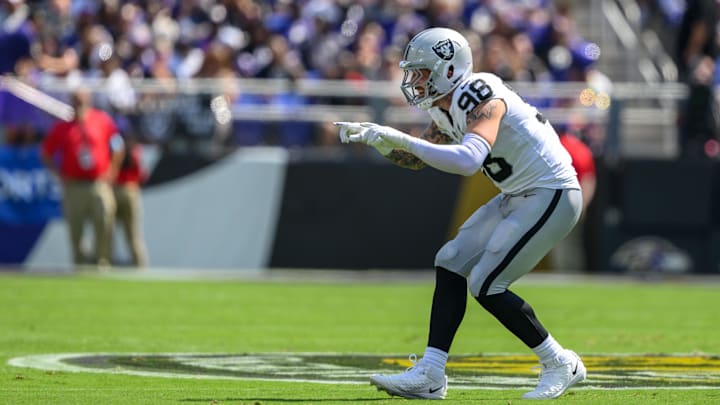 Sep 15, 2024; Baltimore, Maryland, USA; Las Vegas Raiders defensive end Maxx Crosby (98) celebrates after a sack during the first half against the Baltimore Ravens at M&T Bank Stadium. Mandatory Credit: Reggie Hildred-Imagn Images Sep 15, 2024; Baltimore, Maryland, USA; Las Vegas Raiders defensive end Maxx Crosby (98) celebrates after a sack during the first half against the Baltimore Ravens at M&T Bank Stadium. Mandatory Credit: Reggie Hildred-Imagn Images