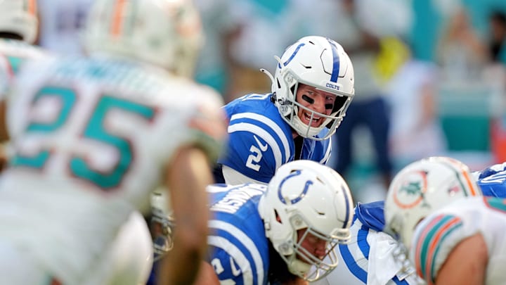 Indianapolis Colts quarterback Carson Wentz (2) calls the snap at the line during the second half against the Miami Dolphins at Hard Rock Stadium in a 2021 game. Indianapolis Colts quarterback Carson Wentz (2) calls the snap at the line during the second half against the Miami Dolphins at Hard Rock Stadium in a 2021 game.