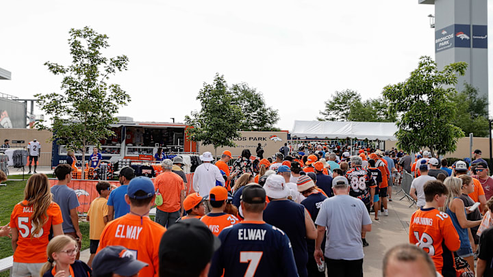 Jul 26, 2024; Englewood, CO, USA; Fans wait in line for Denver Broncos training camp at Broncos Park Powered by CommonSpirit. 