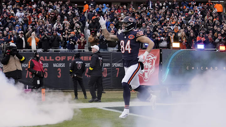 Jan 4, 2026; Chicago, Illinois, USA; Chicago Bears tight end Colston Loveland (84) runs onto the field before the game between the Chicago Bears and the Detroit Lions at Soldier Field. Mandatory Credit: David Banks-Imagn Images