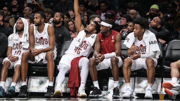 Feb 8, 2024; Brooklyn, New York, USA; Cleveland Cavaliers guard Donovan Mitchell (45) celebrates on the bench in the fourth quarter against the Brooklyn Nets at Barclays Center. Mandatory Credit: Wendell Cruz-Imagn Images
