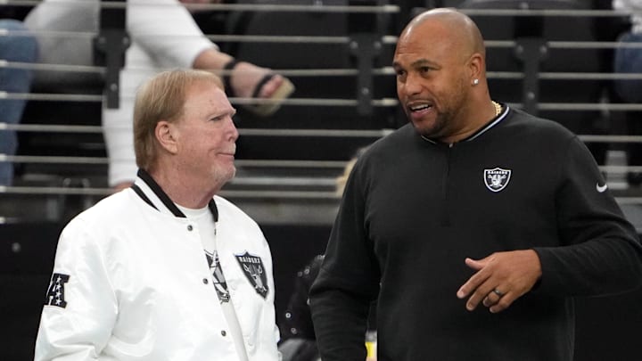 Nov 24, 2024; Paradise, Nevada, USA; Las Vegas Raiders owner Mark Davis (left) talks with coach Antonio Pierce duirng the game against the Denver Broncos at Allegiant Stadium. Mandatory Credit: Kirby Lee-Imagn Images