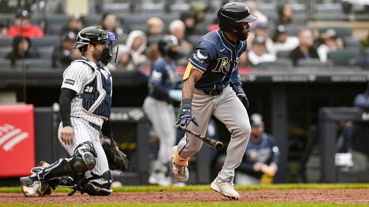 May 24, 2026; Bronx, New York, USA; Tampa Bay Rays center fielder Cedric Mullins (31) hits a single against the New York Yankees during the ninth inning at Yankee Stadium.