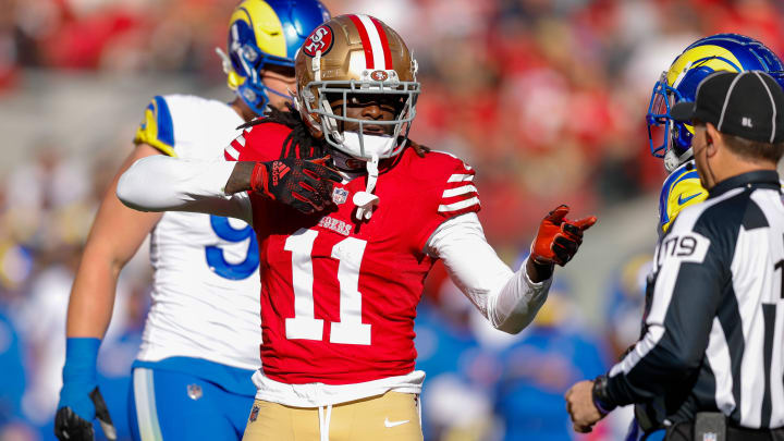 Jan 7, 2024; Santa Clara, California, USA; San Francisco 49ers wide receiver Brandon Aiyuk (11) celebrates after a play against the Los Angeles Rams during the first quarter at Levi's Stadium. Mandatory Credit: Sergio Estrada-USA TODAY Sports Jan 7, 2024; Santa Clara, California, USA; San Francisco 49ers wide receiver Brandon Aiyuk (11) celebrates after a play against the Los Angeles Rams during the first quarter at Levi's Stadium. Mandatory Credit: Sergio Estrada-USA TODAY Sports