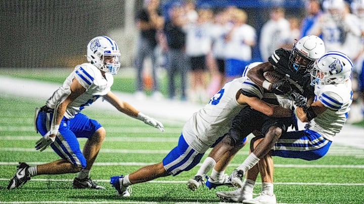 The Waukee Northwest defense makes a stop on the Roosevelt offense on Thursday, Sept. 12, 2024, at Mediacom Stadium in Des Moines. The Waukee Northwest defense makes a stop on the Roosevelt offense on Thursday, Sept. 12, 2024, at Mediacom Stadium in Des Moines.