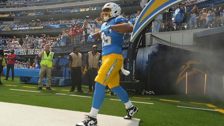 Sep 29, 2024; Inglewood, California, USA; Los Angeles Chargers linebacker Tuli Tuipulotu (45) enters the field before the game against the Kansas City Chiefs at SoFi Stadium. Mandatory Credit: Kirby Lee-Imagn Images