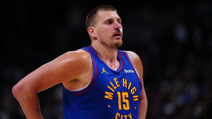 Apr 19, 2025; Denver, Colorado, USA; Denver Nuggets center Nikola Jokic (15) at the free throw line during overtime against the LA Clippers at Ball Arena. Mandatory Credit: Ron Chenoy-Imagn Images