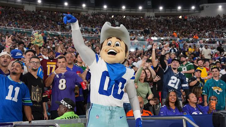 Dallas Cowboys mascot Rowdy poses with fans during the game against the Baltimore Ravens at Maracana Stadium Dallas Cowboys mascot Rowdy poses with fans during the game against the Baltimore Ravens at Maracana Stadium
