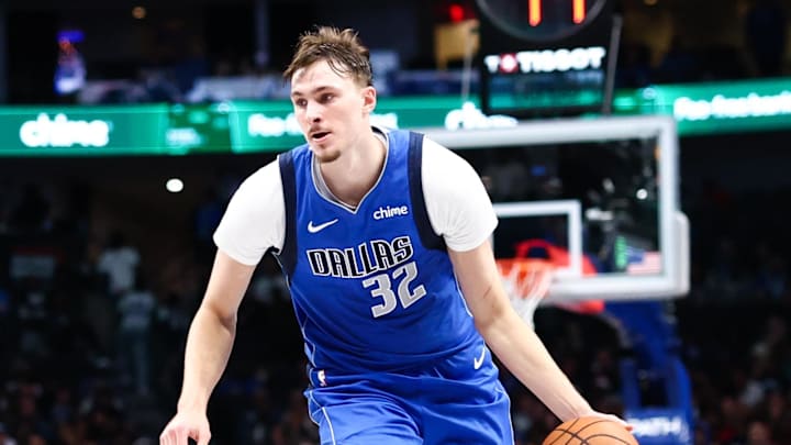 Nov 5, 2025; Dallas, Texas, USA;  Dallas Mavericks forward Cooper Flagg (32) controls the ball during the second half against the New Orleans Pelicans at American Airlines Center. Mandatory Credit: Kevin Jairaj-Imagn Images