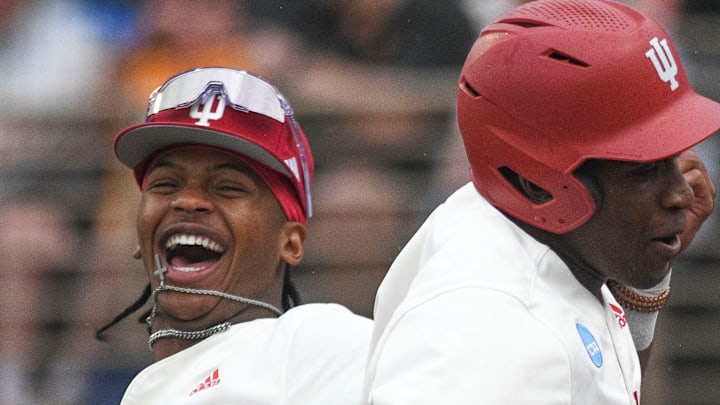 Indiana's Devin Taylor (5) and Indiana's Andrew Wiggins (13) celebrate after Taylor hits a home run during a NCAA Baseball Tournament Knoxville Regional game at Lindsey Nelson Stadium on Saturday, June 1, 2024 in Knoxville, Tenn.