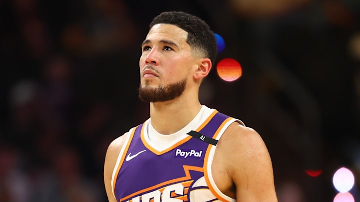 Jan 29, 2025; Phoenix, Arizona, USA; Phoenix Suns guard Devin Booker (1) against the Minnesota Timberwolves at Footprint Center. Mandatory Credit: Mark J. Rebilas-Imagn Images Jan 29, 2025; Phoenix, Arizona, USA; Phoenix Suns guard Devin Booker (1) against the Minnesota Timberwolves at Footprint Center. Mandatory Credit: Mark J. Rebilas-Imagn Images