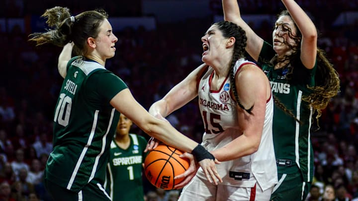 Oklahoma center Raegan Beers fights for a ball against Michigan State in the NCAA Tournament.