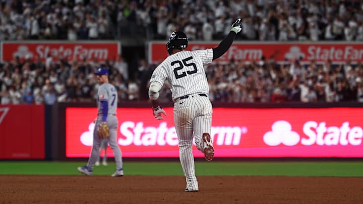 New York Yankees second baseman Gleyber Torres hits a two run home run in the third inning against the Kansas City Royals during Game 1 of the ALDS at Yankee Stadium. 