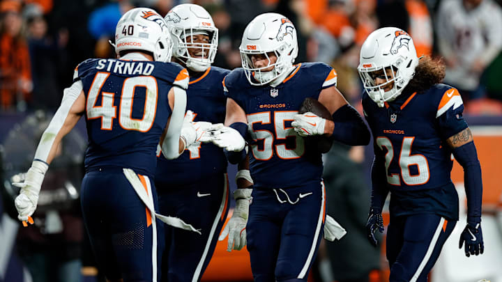 Dec 2, 2024; Denver, Colorado, USA; Denver Broncos linebacker Cody Barton (55) celebrates his interception with linebacker Justin Strnad (40) and defensive tackle Jordan Jackson (94) and safety Devon Key (26) in the fourth quarter against the Cleveland Browns at Empower Field at Mile High. Dec 2, 2024; Denver, Colorado, USA; Denver Broncos linebacker Cody Barton (55) celebrates his interception with linebacker Justin Strnad (40) and defensive tackle Jordan Jackson (94) and safety Devon Key (26) in the fourth quarter against the Cleveland Browns at Empower Field at Mile High.
