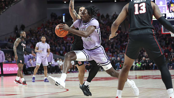 Jan 27, 2024; Houston, Texas, USA; Kansas State Wildcats forward Arthur Kaluma (24) drives with the ball to the basket.